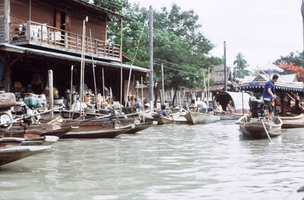 Boats Parked near Storefronts