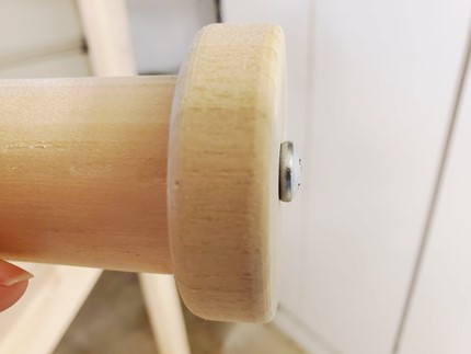 Close-up of an End Stop on the End of a Closet Rod